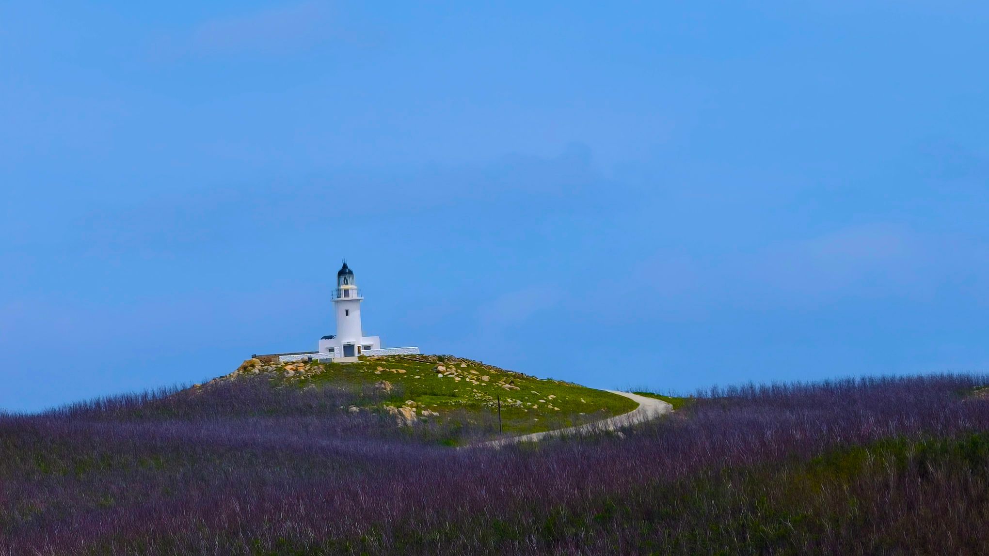 花嶼燈塔是遊客打卡熱門景點也是臺灣最西的燈塔。(記者黃富貴攝)